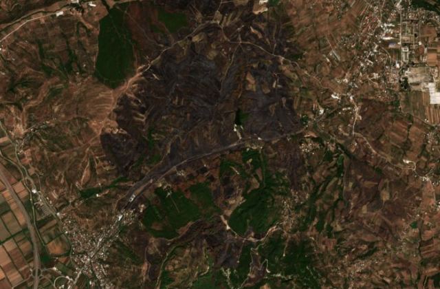Burned area near Fier from space